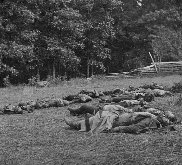 Framed Print : The Civil War. The Battle of Gettysburg. Confederate dead gathered for burial at the southwestern edge of the Rose woods, July 5, 1863 Framed Print : The Civil War. The Battle of Gettysburg. Confederate dead gathered for burial at the southwestern edge of the Rose woods, July 5, 1863
