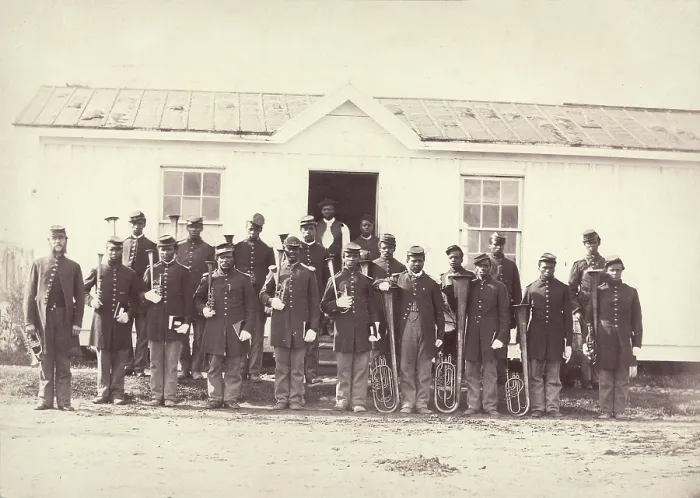 Framed Print : The Civil War, group of 21 African American men holding musical instruments, title: Band of 107th U.S. Colored Infantry, Arlington, Virginia, photograph by William M Framed Print : The Civil War, group of 21 African American men holding musical instruments, title: Band of 107th U.S. Colored Infantry, Arlington, Virginia, photograph by William M