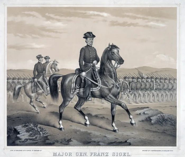 Framed Print : The Civil War. Major General Franz Sigel, full-length portrait, facing right, riding on horseback with troops marching in formation.Lithograph ca. 1862 Framed Print : The Civil War. Major General Franz Sigel, full-length portrait, facing right, riding on horseback with troops marching in formation.Lithograph ca. 1862