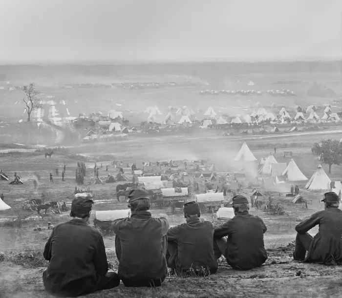 Framed Print : US Civil War, Peninsula Campaign, April-August, 1862. Five seated soldiers look out over the massive encampment of the Army of the Potomac