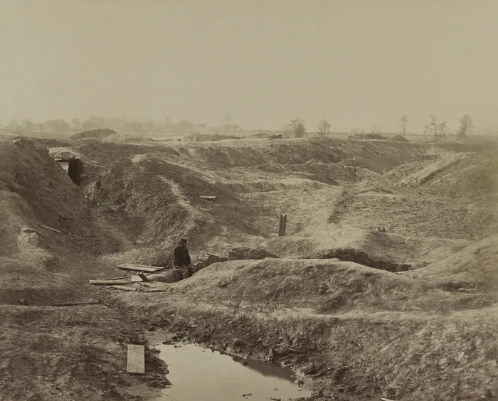 Framed Print : US Civil War. Petersburg Campaign, June 9, 1864 to March 25, 1865. A Union soldier sits within the depression of the crater blown out on July 30, 1864