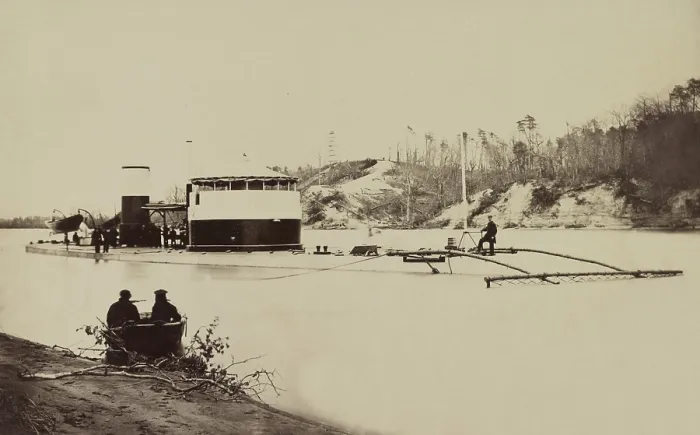 Framed Print : US Civil War, Union Canonicus class on the James River, Virginia, 1864. She is equipped with a minesweeping rake, to locate torpedoes, as mines were called at the time