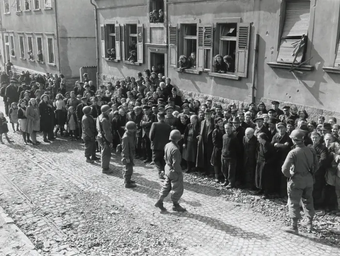 Framed Print : Civilians of Ensheim, Germany, defied of Hitler's orders to join the Nazi resistance. Instead, they were taken into safe temporary evacuation by the Seventh Army troops