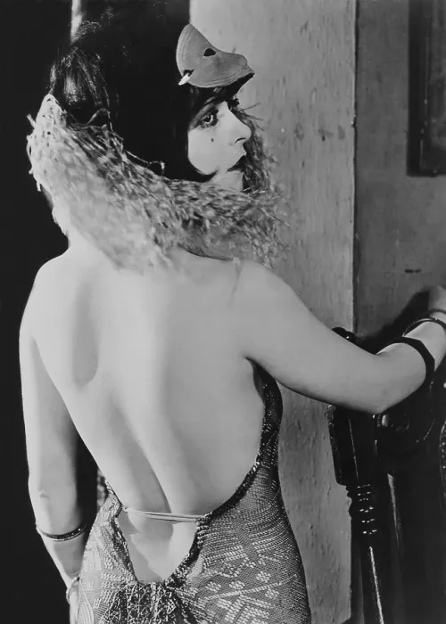Framed Print : Clara Bow, (1905-1965) in a costume with very low cut back. 1920s