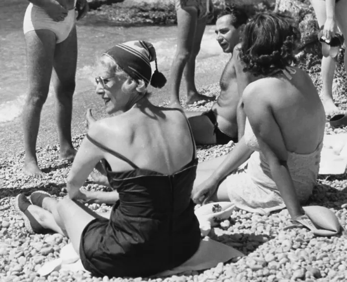 Framed Print : Clare Booth Luce (wearing hat) relaxes with friends at the Beach on Capri Island, Italy. Aug. 28, 1953. She served as U.S. Ambassador to Italy from May 1953 to April 1956 Framed Print : Clare Booth Luce (wearing hat) relaxes with friends at the Beach on Capri Island, Italy. Aug. 28, 1953. She served as U.S. Ambassador to Italy from May 1953 to April 1956