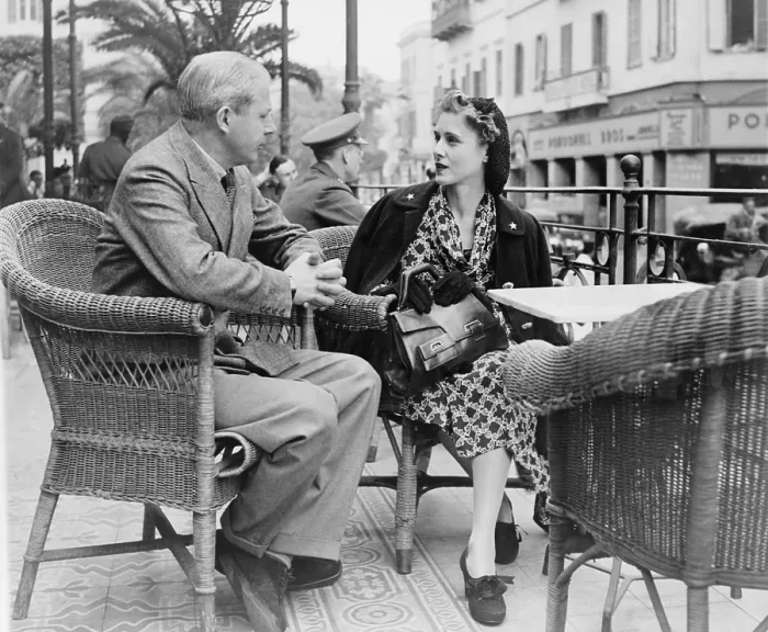 Framed Print : Clare Boothe Luce (1903-1987) on the terrace of Shepherds Hotel discussing the plans of her middle east tour with Douglas Williams, in Cairo. 1942 Framed Print : Clare Boothe Luce (1903-1987) on the terrace of Shepherds Hotel discussing the plans of her middle east tour with Douglas Williams, in Cairo. 1942