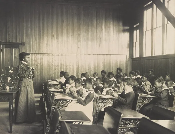 Framed Print : Classroom at Whittier Primary School, associated with Hampton Institute, Virginia, 1899-1900. An African American teacher appears to be giving a lesson about the cotton plant Framed Print : Classroom at Whittier Primary School, associated with Hampton Institute, Virginia, 1899-1900. An African American teacher appears to be giving a lesson about the cotton plant