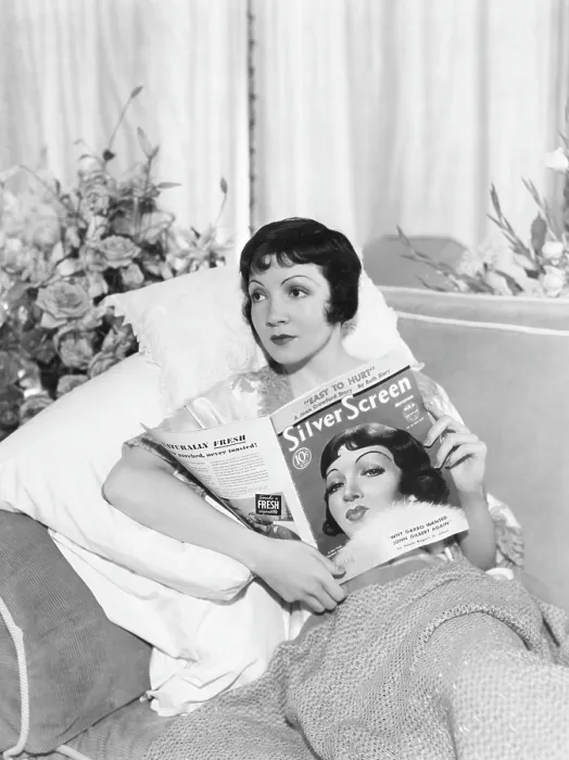 Framed Print : Claudette Colbert with copy of Silver Screen magazine which has her on the cover, 1933 Framed Print : Claudette Colbert with copy of Silver Screen magazine which has her on the cover, 1933