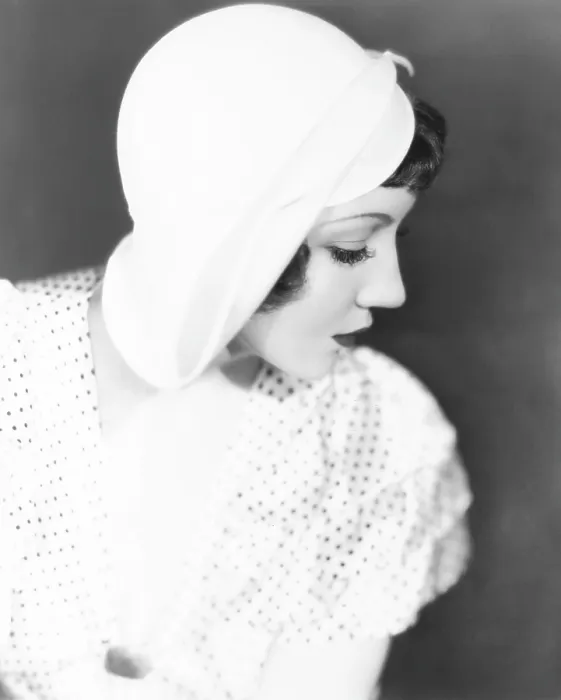 Framed Print : Claudette Colbert in summer hat desighned by Jas. Hopkins, 1934