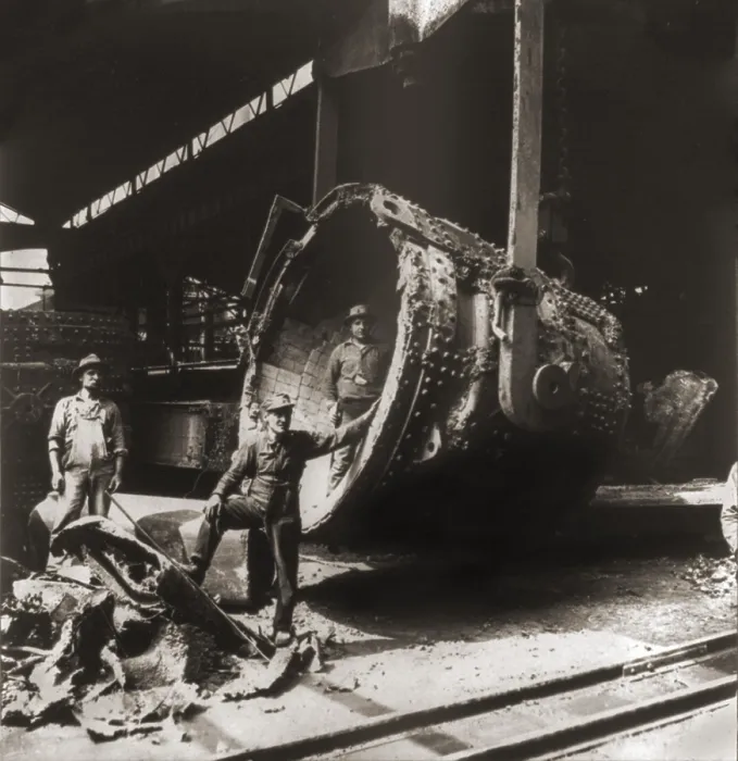 Framed Print : Cleaning and repairing the clay lined ladle, that holds molten iron and steel at a Pittsburgh, Pennsylvania steel works. 1905