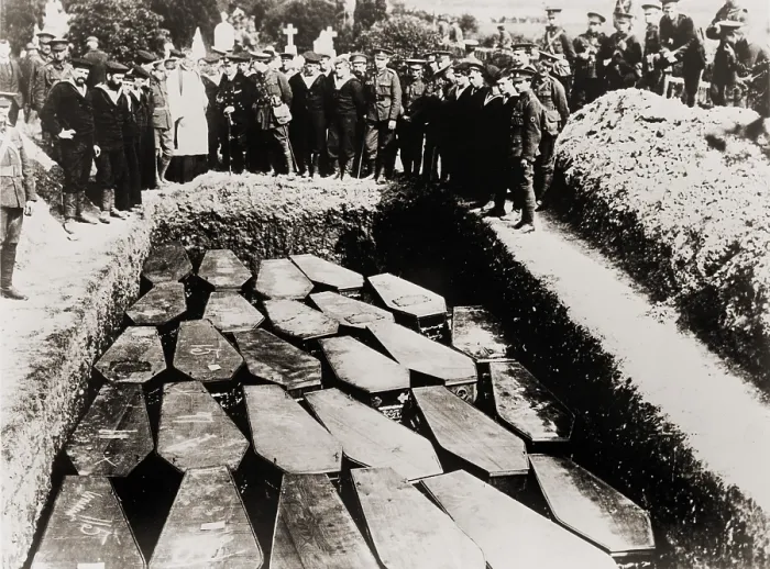 Framed Print : Clergy and military witness the common grave burial of Lusitania victims, in Ireland, after their recovery from sea. 1915