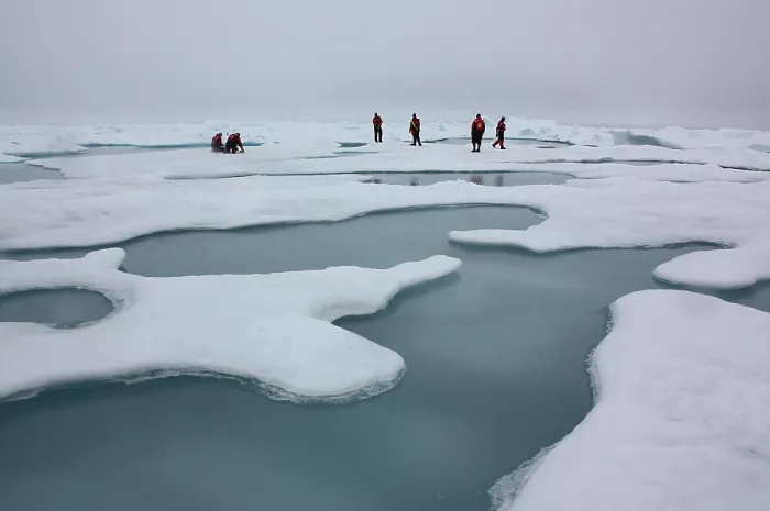 Framed Print : Climate scientists studying Arctic sea ice and melt ponds in the Chukchi Sea. July 4, 2010