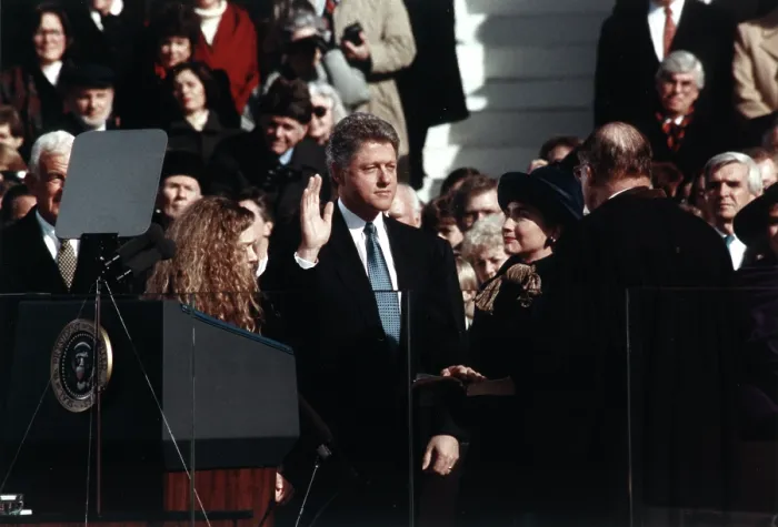 Framed Print : Bill Clinton (center), taking the oath of office of President of the United States, daughter Chelsea Clinton stands at front left, wife Hillary Rodham Clinton stands front