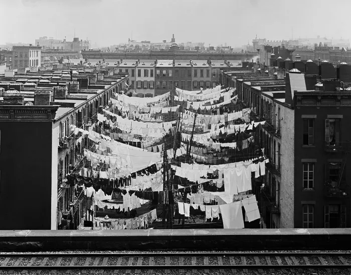 Framed Print : Clothes drying on lines between New York City tenements at Park Avenue and 107th Street. In the foreground are the tracks of an elevated railroad, c. 1900 (BSLOC_2018_3_94) Framed Print : Clothes drying on lines between New York City tenements at Park Avenue and 107th Street. In the foreground are the tracks of an elevated railroad, c. 1900 (BSLOC_2018_3_94)
