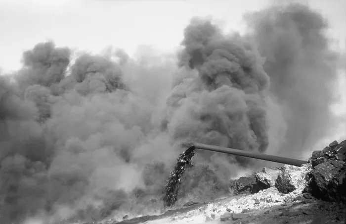 Framed Print : Clouds of black smoke obscure fire on an Iraq Petroleum Company well in the Kirkuk District of Iraq. 1932