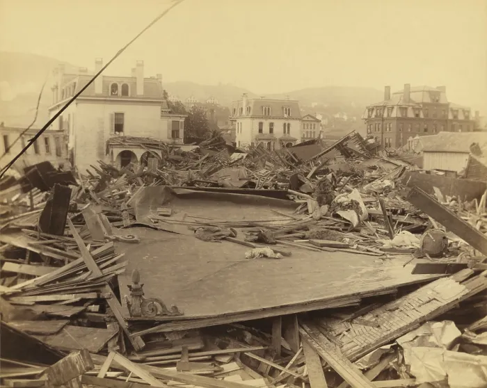 Framed Print : Club House and Morrell Institute standing in the debris after the Johnstown Flood of May 31st, 1889. Both buildings served as havens of safety