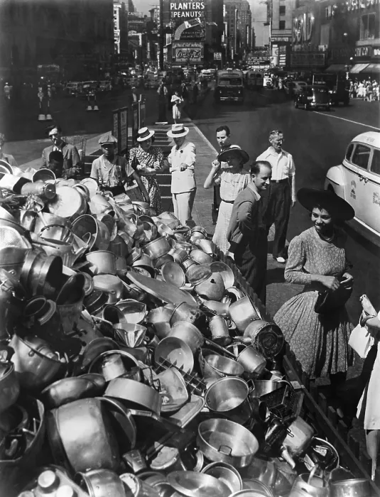Framed Print : Collection point in New York City for aluminum during World War 2. Ca. 1942-45. African American and White pedestrians smile at the pots collected for the war effort Framed Print : Collection point in New York City for aluminum during World War 2. Ca. 1942-45. African American and White pedestrians smile at the pots collected for the war effort
