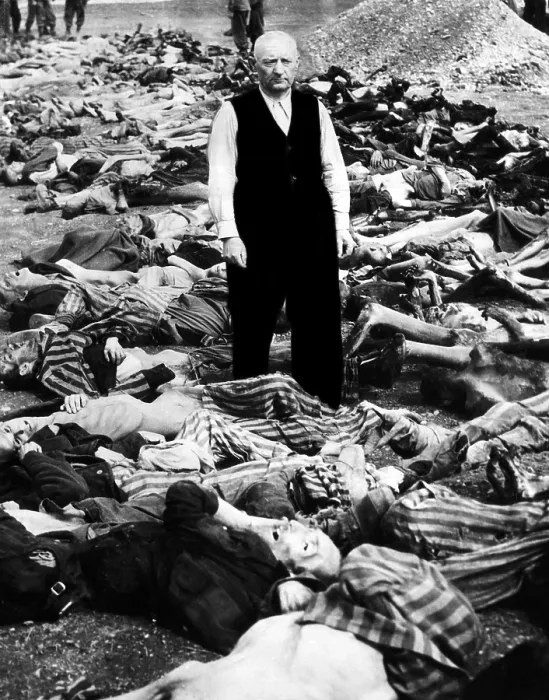 Framed Print : The commandant of the concentration camp in Landsberg, Germany stands amid some of the prisoners that were shot or burned as American soldiers approached, 1945 Framed Print : The commandant of the concentration camp in Landsberg, Germany stands amid some of the prisoners that were shot or burned as American soldiers approached, 1945