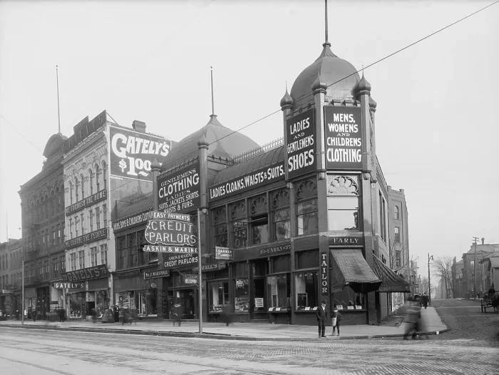 Framed Print : Commercial street in Detroit, MI, includes a credit parlor among clothing and furniture stores Framed Print : Commercial street in Detroit, MI, includes a credit parlor among clothing and furniture stores