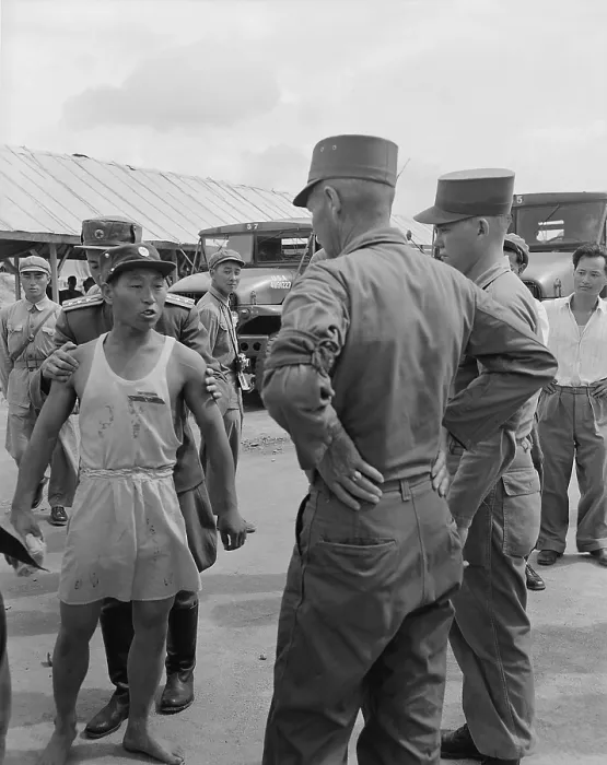 Framed Print : Communist POW verbally abuses an American Army Major during the UN POW exchange