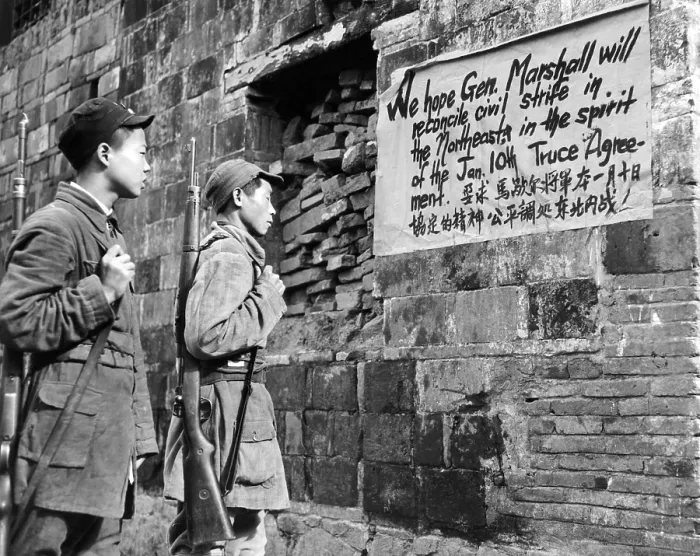Framed Print : Communist Soldiers of the New Fourth Army reading a sign painted in English and Chinese, urging Sino-American friendship and calling for increased hope that Gen. George C
