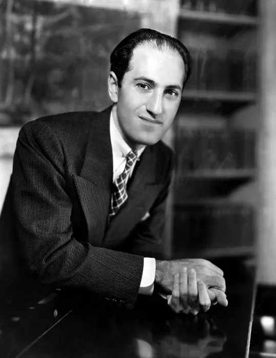 Framed Print : Composer George Gershwin at the piano in his New York apartment. ca. 1930s. Courtesy: CSU Archives / Everett Collection