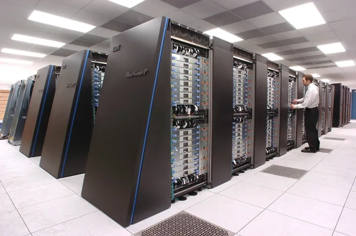 Framed Print : Computer scientist at Argonne National Laboratory inspects the new IBM Blue Gene / P supercomputer, recently named the fastest computer for open science in the world. 2009 Framed Print : Computer scientist at Argonne National Laboratory inspects the new IBM Blue Gene / P supercomputer, recently named the fastest computer for open science in the world. 2009