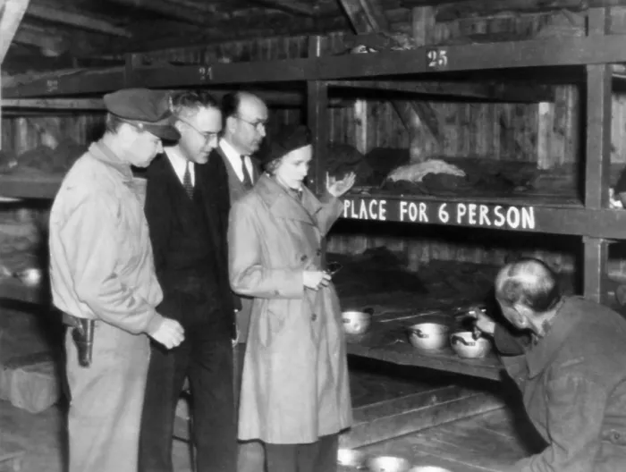 Framed Print : A concentration camp prisoner (right) shows Lieutenant General Hoyt Vandenburg, Congressmen John Kunkel and Leonard Hall Framed Print : A concentration camp prisoner (right) shows Lieutenant General Hoyt Vandenburg, Congressmen John Kunkel and Leonard Hall