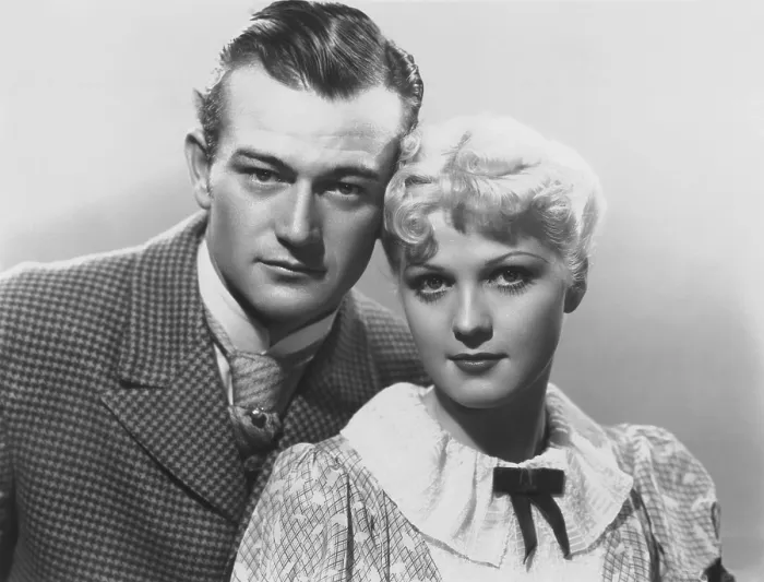 Framed Print : CONFLICT, from left: John Wayne, Jean Rogers, 1936 Framed Print : CONFLICT, from left: John Wayne, Jean Rogers, 1936