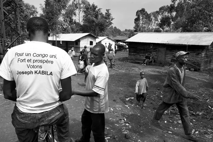 Framed Print : CONGO, Democratic Republic of the. NORTH KIVU. Democratic Republic of the Congo (2008). Kivu Conflict. Surrounding of Goma. Village and supporter of president Joseph Kabila Framed Print : CONGO, Democratic Republic of the. NORTH KIVU. Democratic Republic of the Congo (2008). Kivu Conflict. Surrounding of Goma. Village and supporter of president Joseph Kabila