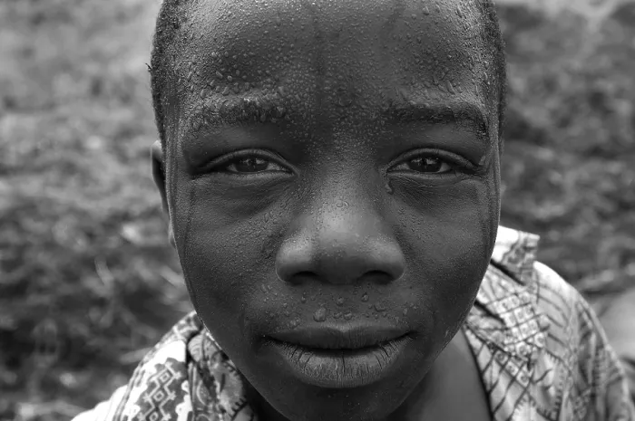 Framed Print : CONGO, Democratic Republic of the. NORTH KIVU. Democratic Republic of the Congo (2008). Kivu Conflict. Refugee camp of Mugunga I (20000 people). Boy Framed Print : CONGO, Democratic Republic of the. NORTH KIVU. Democratic Republic of the Congo (2008). Kivu Conflict. Refugee camp of Mugunga I (20000 people). Boy
