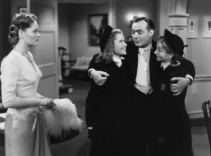 Framed Print : THE CONSTANT NYMPH, from left, Alexis Smith, Joyce Reynolds, Charles Boyer, Joan Fontaine, 1943