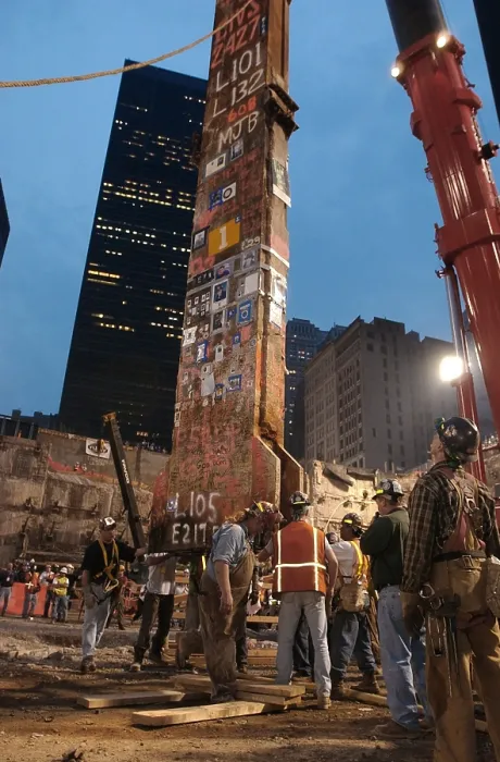 Framed Print : Construction workers maneuver the last piece of debris removed from Ground Zero. May 28, 2002 Framed Print : Construction workers maneuver the last piece of debris removed from Ground Zero. May 28, 2002