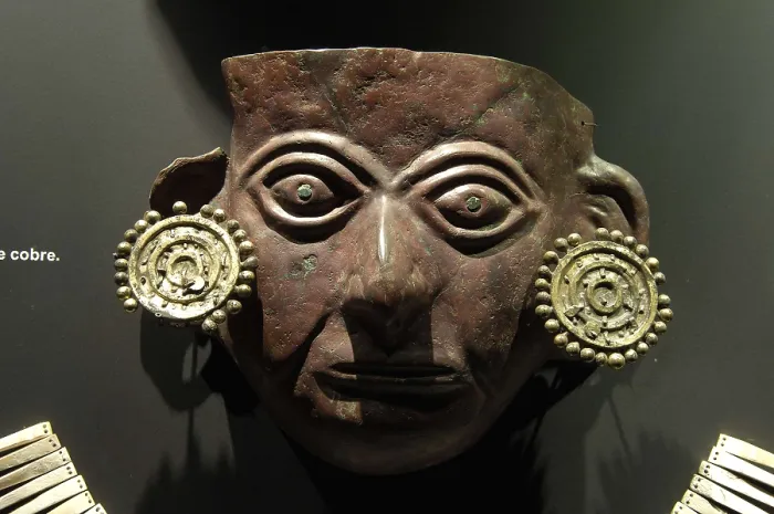 Framed Print : Copper mask (3rd c. AD). Moche or Mochica Art. PERU. Sipn. Royal Tombs of Sipn Museum. AISA / Everett Collection**US SALES ONLY**