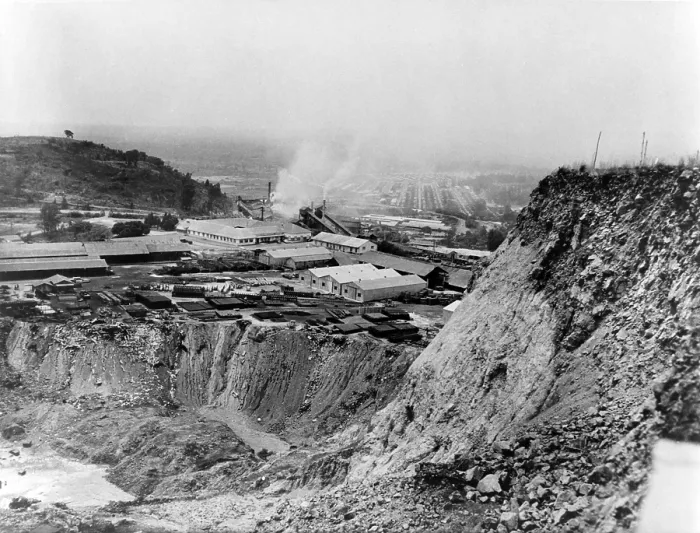 Framed Print : Copper smelting plant and area below that has been strip mined, Katanga province