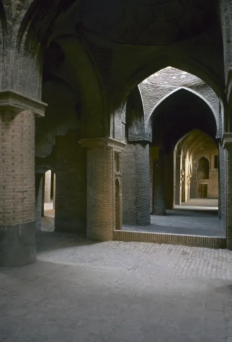 Framed Print : Corridor in the Friday Mosque (Masijd-i jami), 12th Century, mixed technique - Detail. View of the long corridor with strong pillars and pointed arches