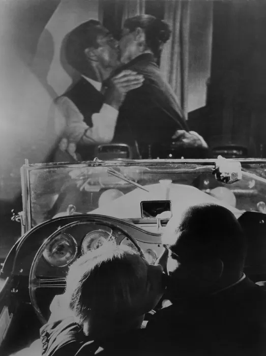 Framed Print : Couple kissing at drive-in theater in Rome, Italy, Sept. 1957. On screen Gary Cooper and Audrey Hepburn are likewise engaged. (BSLOC_2015_14_176)