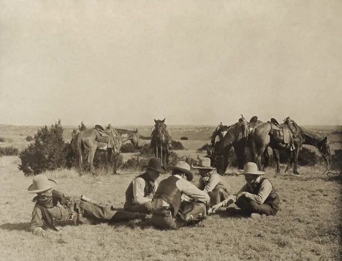 Framed Print : Cowboys playing mumbly peg during a break at the Turkey Track Ranch in Texas in 1906 Framed Print : Cowboys playing mumbly peg during a break at the Turkey Track Ranch in Texas in 1906