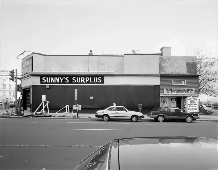 Framed Print : Formerly Crandall's Theater, The Riley Building is now Sunny's Surplus, and Rendezvous Adult Magazines & Films, after having the top floor taken off and windows blocked