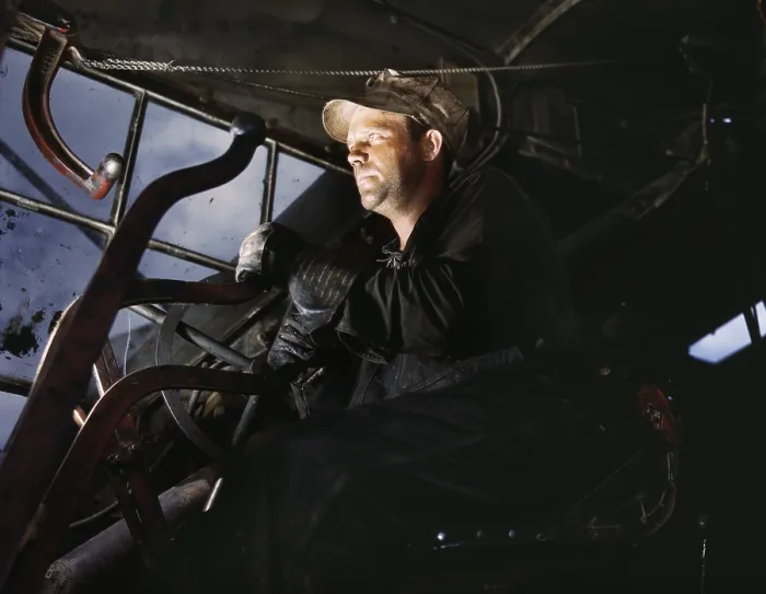 Framed Print : Crane operator at TVA's Douglas Dam, Tennessee. After U.S. entry into World War 2, construction on this dam was important to provide power for the defense industry. June 1942