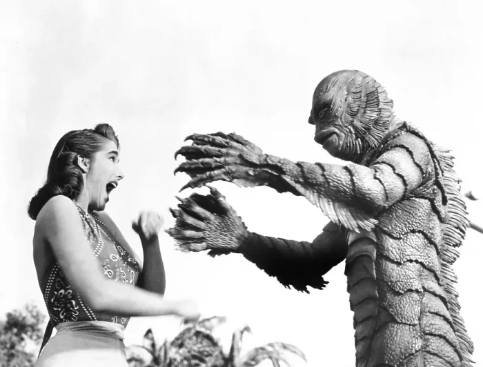 Framed Print : CREATURE FROM THE BLACK LAGOON, from left: Julie Adams, Ben Chapman, 1954