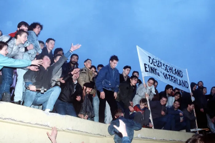 Framed Print : A crowd celebrates atop the Berlin Wall following the official opening of the Brandenburg Gate on Dec. 22 1989. (BSLOC_2011_3_50) Framed Print : A crowd celebrates atop the Berlin Wall following the official opening of the Brandenburg Gate on Dec. 22 1989. (BSLOC_2011_3_50)