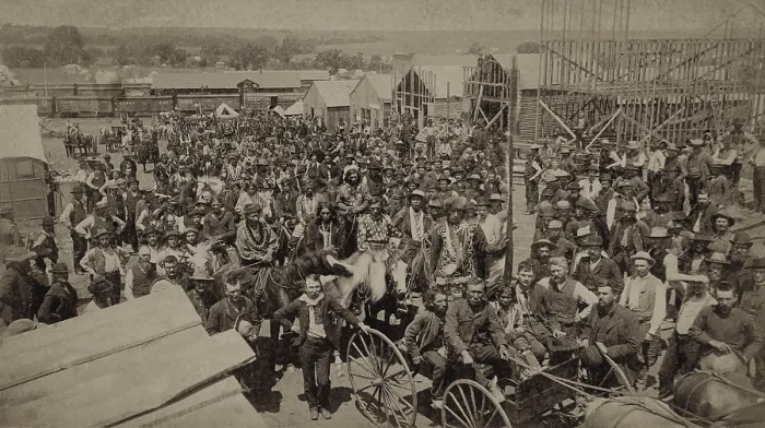 Framed Print : Crowd of men, most looking toward the photographer, in Guthrie, Oklahoma, four weeks after the 1889 Land Rush'. It includes Native Americans is distinctive clothing Framed Print : Crowd of men, most looking toward the photographer, in Guthrie, Oklahoma, four weeks after the 1889 Land Rush'. It includes Native Americans is distinctive clothing