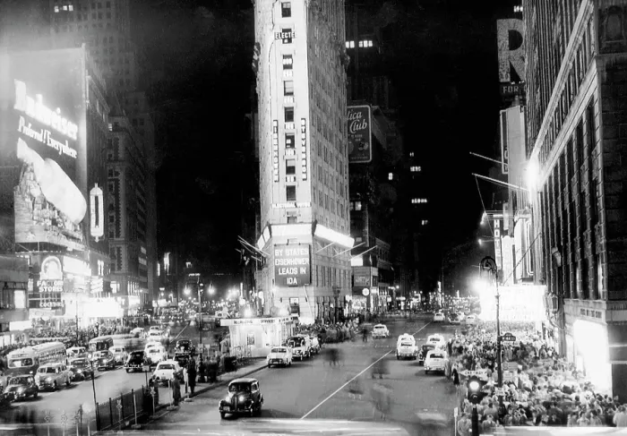Framed Print : Crowds in Times Square await the results of the Presidential election. The New York Times Building announces an early lead for Dwight Eisenhower. New York City, November 4, 1952 Framed Print : Crowds in Times Square await the results of the Presidential election. The New York Times Building announces an early lead for Dwight Eisenhower. New York City, November 4, 1952