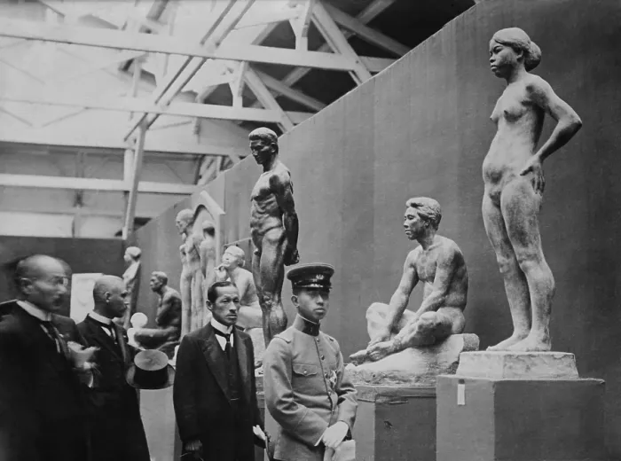 Framed Print : Crown Prince Hirohito at an exhibition of sculpture. He and his party pause at an realistic modern female nude statue. Ca. 1920. - (BSLOC_2014_15_144)