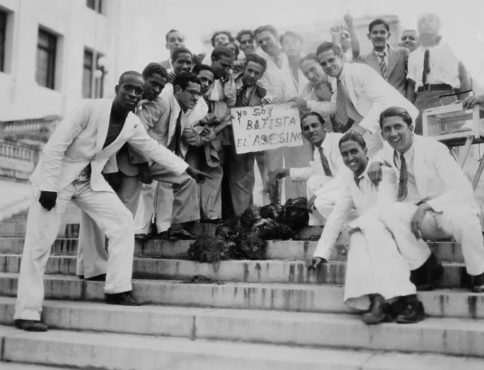 Framed Print : Cuba marks the first anniversary of the coup that overthrew the liberal Cespedes government. This group protested with a burned effigy the coup's leader, Col