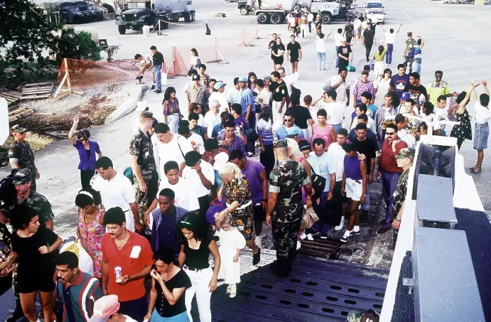 Framed Print : Cuban migrants at Guantanamo Bay Naval Base assembling for their flight to Homestead Air Force Base Florida where they will be admitted to the U.S