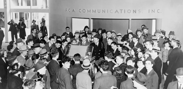 Framed Print : A curious crowd surrounds a demonstration of television at RCA exhibit at 1939 World's Fair