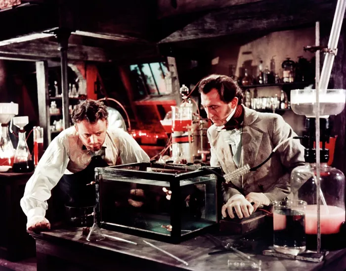 Framed Print : THE CURSE OF FRANKENSTEIN, from left: Robert Urquhart, Peter Cushing, 1957 Framed Print : THE CURSE OF FRANKENSTEIN, from left: Robert Urquhart, Peter Cushing, 1957