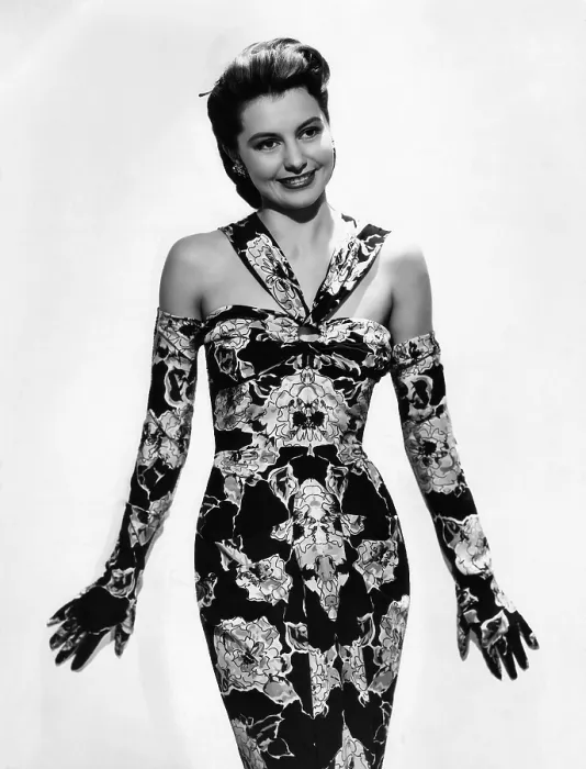 Framed Print : Cyd Charisse modeling flowered evening dress and matching gloves, ca. 1947